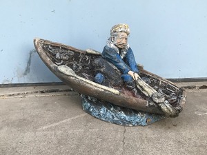 lot 150 image: Solid Concrete Yard Decoration Man in a Fishing Boat with his Dog