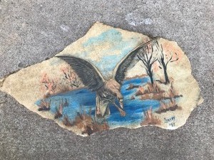 lot 184 image: Art work on a Stone with a Goose Landing into a Pond