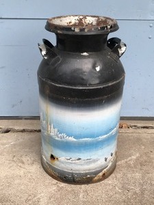 lot 191 image: Vintage Metal Can with Art Painted on the Side - Deer on a Lake with Cabin and Trees