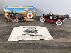 lot 253 image: 1997 ERTL 1917 Maxwell Touring Car Texaco - 125 scale die cast coin bank - #1157