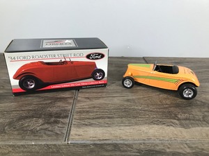 lot 257 image: 1998 Liberty Classics 1934 Ford Roadster Street Rod - Back to the 50s 4th edition Minnesota street Rod association -125 scale die cast coin bank - #8070