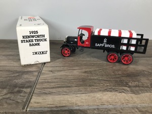 lot 260 image: 1993 ERTL 1925 Kenworth Stake Truck Bank - Sapp Bros. - 138 scale die cast - #2845