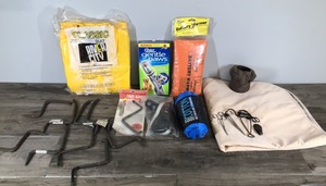 lot 362 image: 10 Deer Stand Screw in Tree Steps - Chocolate Lab Koosie - River City 200 Series Rain Suit - Philips Battery Warmer and More