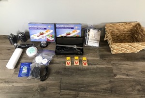 lot 561 image: 2 Inflatable Serving Bars (New in package) - Caregiver Pager - Mouse Traps - Sea Salt - Garbage Bags - Electric Turkey Carving Knife - Panasonic Phone System and More