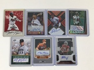 lot 649 image: Lot of 7 Autographed Baseball & Football Cards all in Top Loaders