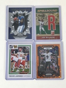 lot 652 image: Lot of 4 Football Cards all in Top Loaders - Joe Burrow - Trevor Lawrence - Justin Tucker - Anthony Richardson