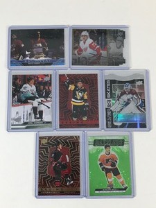 lot 658 image: Lot 7 Hockey Cards all in Top Loaders - Andrei Svechnikov - Morgan Frost Kirill Kaprizov - Jake Quentzel - Nikita Zadorov - Simon Edwinsson- Alexandar Georgiev
