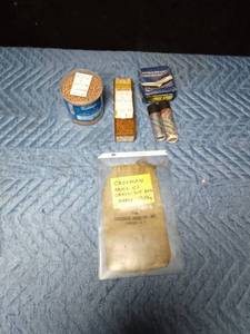lot 616 image: BBs and early Crossman Arms Co. cartridge bag