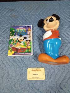 lot 542 image: Mickey Mouse bank and DVD and a Coney Island ticket