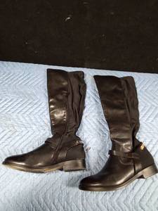 lot 535 image: Knee high Bore Trap leather spandex boots