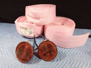 lot 526 image: 3 Rolls of pink foam and to trailer tail lights