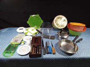 lot 529 image: All in one salad maker, dicer, juicer. Knives, bowls pan, spatulas, metal tea pot and more