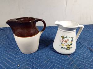 lot 515 image: 1 Pottery pitcher and 1 ceramic Sioux Falls Milk Foundation pitcher