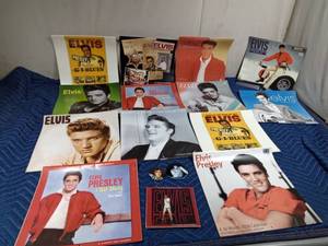 lot 510 image: Elvis Presley calendars and pins