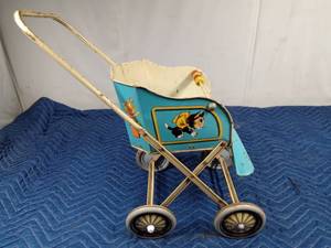 lot 496 image: Vintage metal doll stroller with metal tires