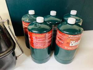 lot 15 image: Propane Grill, Folding Camp Table, 5 new Propane Cylinders