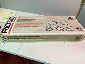 lot 25 image: RIDGID Universal Bench Top Tool Stand - New in Box