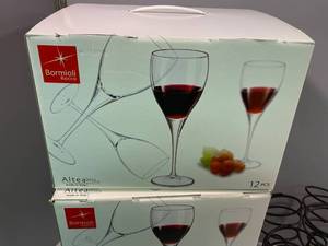 lot 139 image: 3 Boxes (12 in each) Bormioli Rocco Italian Wine Glasses, Bottle Holder and additional everyday Stemware