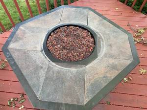 lot 1 image: Large Outdoor Slate Tile Octagon Table with Propane Fire Pit including Tank
