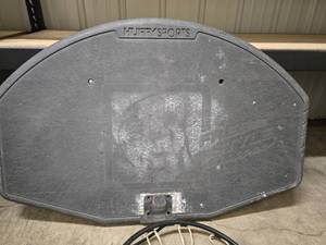 Huffy Sports basketball backboard, hoop and net