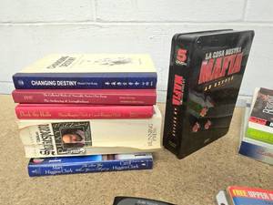 books, 5 DVD set and a Texas Instruments TI-89 Titanium graphing calculator