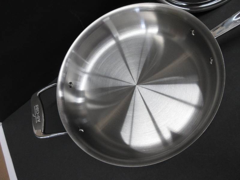 lot 48 image: All-Clad BD55403 D5 Brushed Stainless Steel 5-ply Bonded Cookware, Saute Pan with lid, 3 quart, Silver NEW
