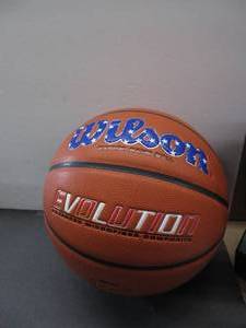 lot 77 image: Wilson Evolution Indoor Basketball Size Unknown SLIGHTLY USED