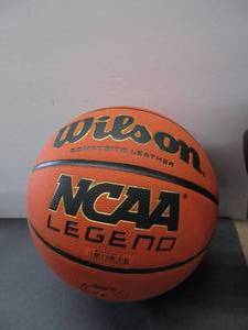lot 78 image: Wilson NCAA Legend Basketball - Size 6 - 28.5, OrangeBlack SLIGHTLY USED