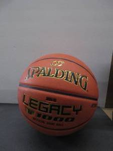 lot 72 image: Spalding Legacy TF 1000 28.5 Size 6 Indoor Basketball SLIGHTLY USED