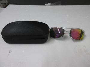 lot 117 image: Revo Sunglasses Cove Polarized Lens with Rounded Square Frame, Crystal Frame with Blue Water Len USED, SMALL SCRATCH
