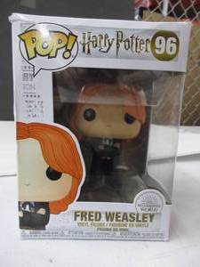 lot 119 image: Funko Pop Movies Harry Potter - Fred Weasley (Yule) DAMAGED BOX, NEW