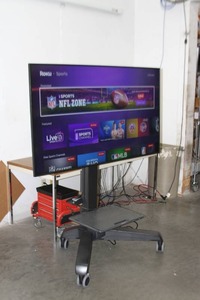 lot 1 image: 65 Samsung 4K UHD LED Commercial-Grade Display  TV with Ergotron Neo-Flex Mobile Media Cart