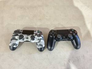 lot 237 image: LOT OF 2 Playstation Controllers