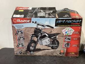 lot 702 image: Razor Dirt Rocket MX350 - Black with Decals Included, 24V Electric-Powered Dirt Bike