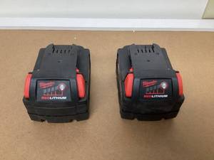 lot 561 image: LOT OF 2 Milwaukee M18 Lithium-Ion 18V 5Ah Extended Capacity Battery 48-11-1852