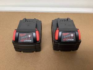 lot 562 image: LOT OF 2 Milwaukee M18 Lithium-Ion 18V 5Ah Extended Capacity Battery 48-11-1852