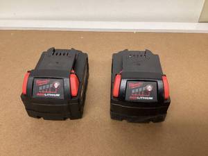 lot 564 image: LOT OF 2 Milwaukee M18 Lithium-Ion 18V 5Ah Extended Capacity Battery 48-11-1852