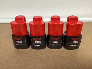 lot 566 image: LOT OF 4 Milwaukee 48-11-2401 Genuine OEM M12 REDLITHIUM Battery