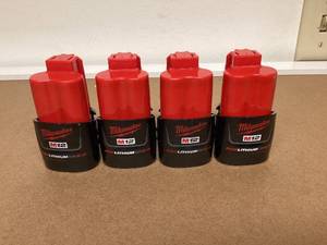 lot 568 image: LOT OF 4 Milwaukee 48-11-2420 M12 RED LITHIUM 2.0