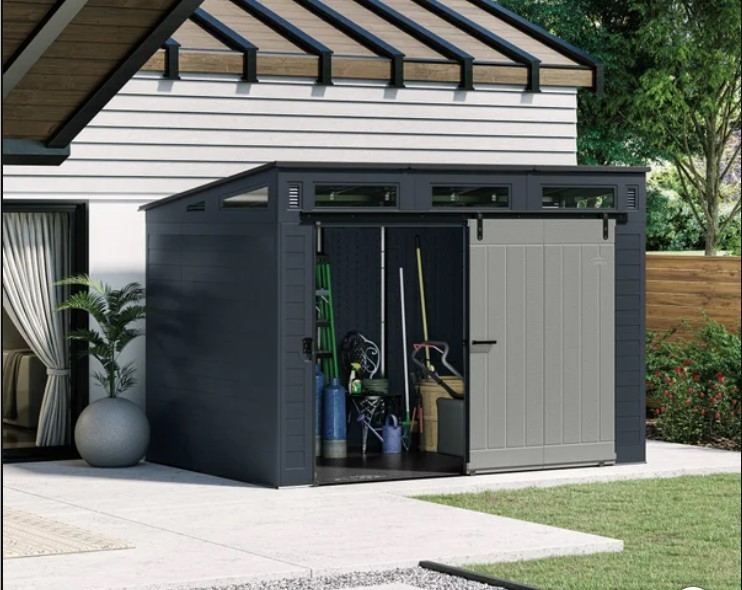 lot 103 image: NEW Suncast Modernist 10 ft x 7 ft. Sliding Door Storage Shed