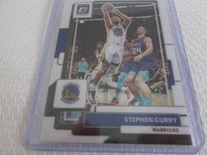 lot 45 image: 2022-23 Optic Stephen Curry Card...