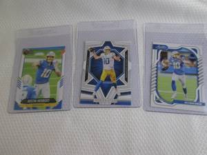 lot 94 image: Justin Herbert  Cards...