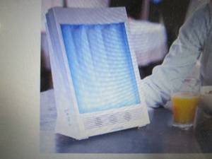 lot 303 image: SunTouch Plus Light and Ion Therapy...