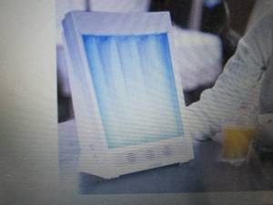 lot 306 image: SunTouch Plus Light and Ion Therapy...