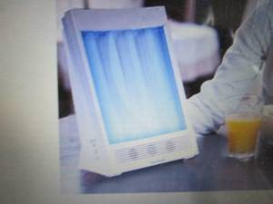 lot 319 image: SunTouch Plus Light and Ion Therapy...