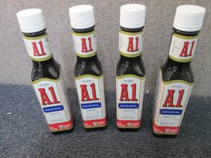 lot 532 image: 4- 5 oz A1 Original Sauce Best Date...