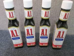 lot 533 image: 4- 5 oz A1 Original Sauce Best Date...