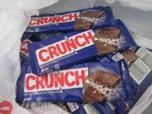 lot 594 image: 12- 1.55 oz Crunch Bars...