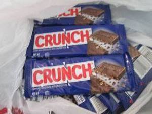 lot 595 image: 12- 1.55 oz Crunch Bars...