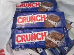lot 596 image: 12- 1.55 oz Crunch Bars...